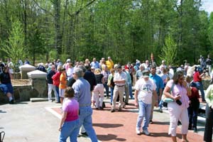 Crowd viewing the inscribed bricks in the Pathway of Honor
